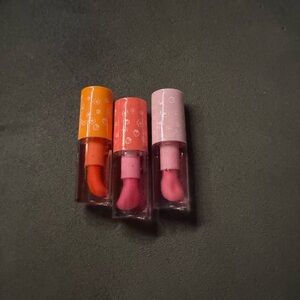 Set of Three Lipsticks in Orange and Pink Shades